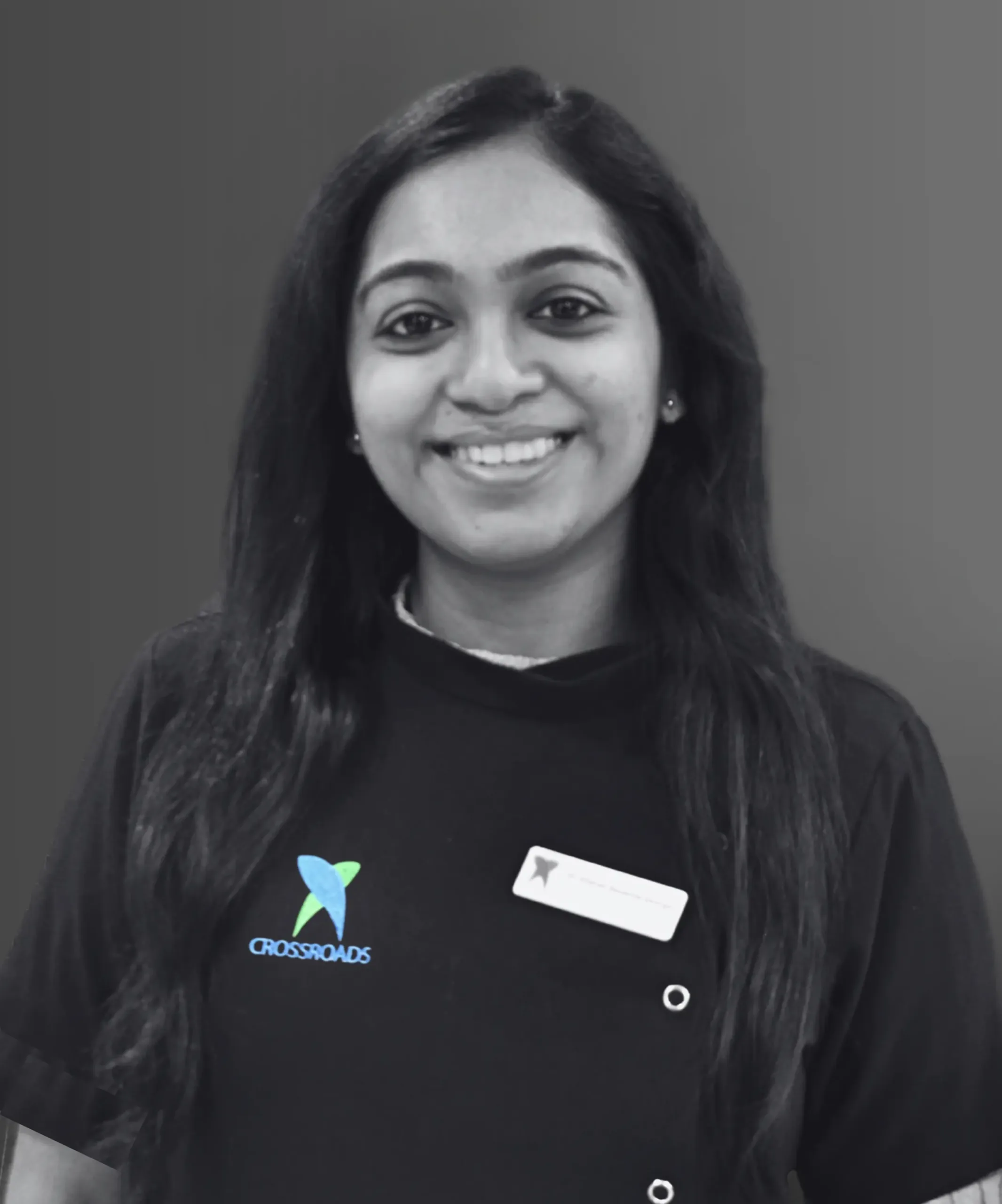 Dr. Sharon George - Specialist Orthodontist at Crossroads Dental Clinic Dubai, expert in braces, Invisalign, and smile correction treatments.